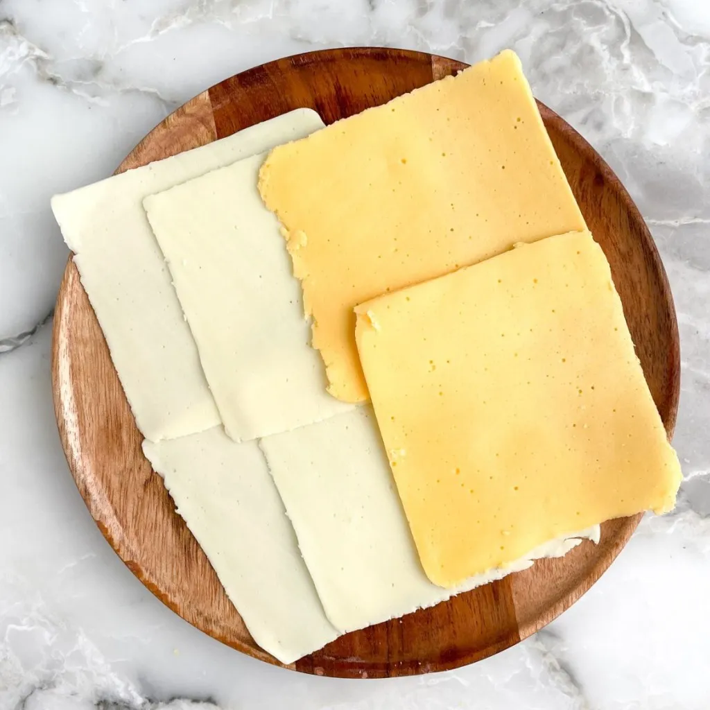 The difference between White and Yellow American cheese